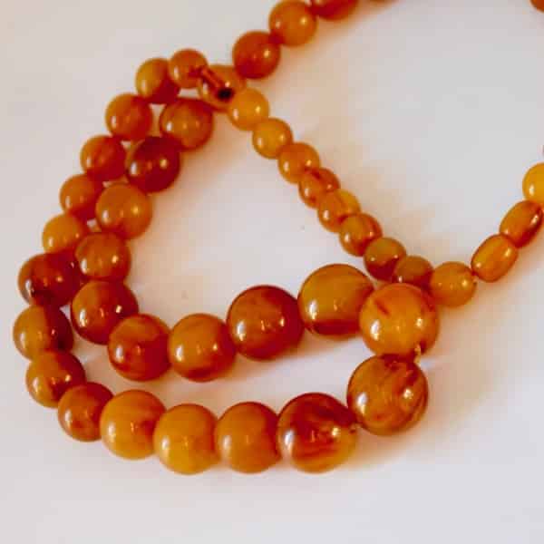 Vintage retro faux amber graduated chunky long beaded necklace. 