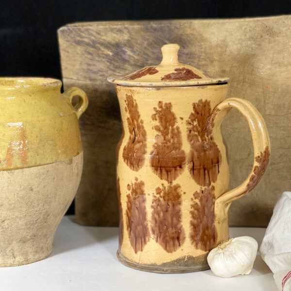 Large antique French pottery pitcher from the 19thy century with cream and brown glaze