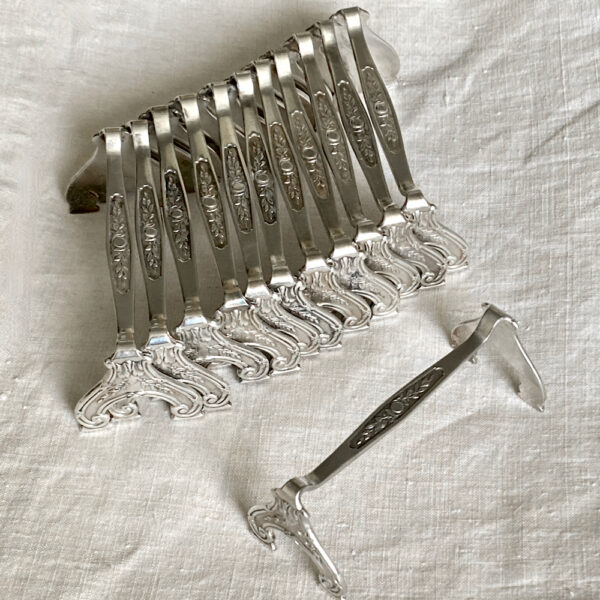 12 Gallia Christofle knife rests, set of cutlery rests, knife holders, 1920s silver plated, French tableware